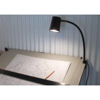 LMP-24C lamp on a drafting table.
